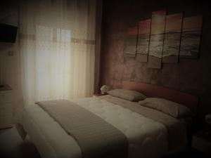 Кровать или кровати в номере Casa&Mare