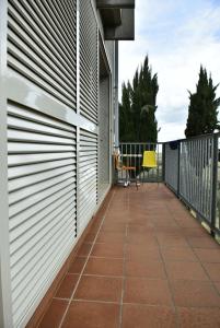 A balcony or terrace at Rental rooms Antonella