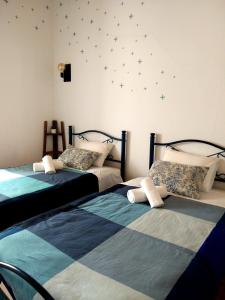Katil atau katil-katil dalam bilik di Orange3 Hostel