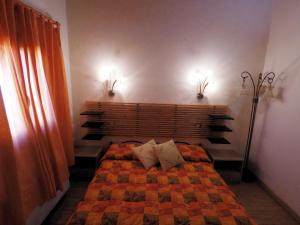 Posteľ alebo postele v izbe v ubytovaní Tenuta La Rosa B&B