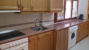 A kitchen or kitchenette at Apartamento Casa Go