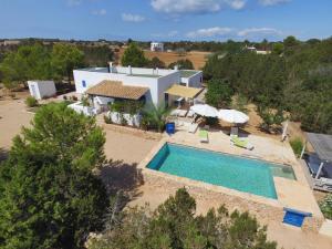 an aerial view of a house with a swimming pool at Can Guasch in Sant Francesc Xavier