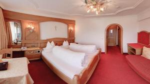 Postel nebo postele na pokoji v ubytování Hotel Purner