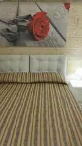Säng eller sängar i ett rum på Borgo dei Filitti