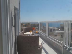 A balcony or terrace at Marsascala Sea View Apartment HPI 7738