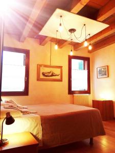 Ένα ή περισσότερα κρεβάτια σε δωμάτιο στο San Marco Venice Apartment