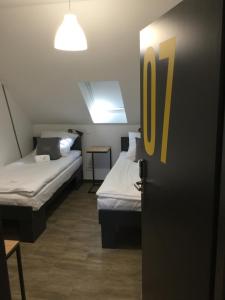 Łóżko lub łóżka w pokoju w obiekcie Kimanoclegi