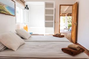 Postel nebo postele na pokoji v ubytování Casa Little China