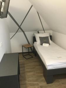 Łóżko lub łóżka w pokoju w obiekcie Kimanoclegi