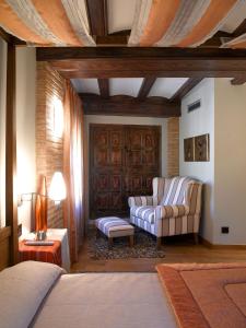 A bed or beds in a room at Hotel Boutique Maribel (Adult Only)
