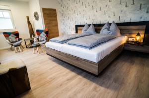 Postel nebo postele na pokoji v ubytování Hotel HaWattn