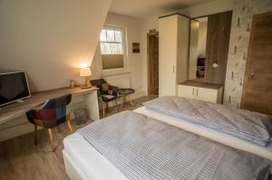 Postel nebo postele na pokoji v ubytování Hotel HaWattn