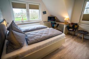 Postel nebo postele na pokoji v ubytování Hotel HaWattn
