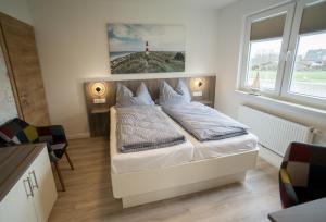 Postel nebo postele na pokoji v ubytování Hotel HaWattn