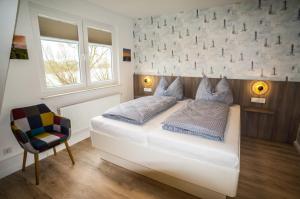 Postel nebo postele na pokoji v ubytování Hotel HaWattn