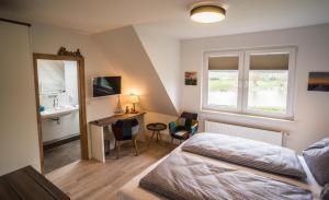 Postel nebo postele na pokoji v ubytování Hotel HaWattn