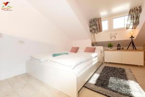 Posteľ alebo postele v izbe v ubytovaní Apartments Opa Opa