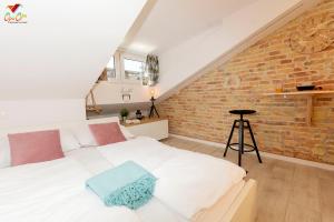 Posteľ alebo postele v izbe v ubytovaní Apartments Opa Opa