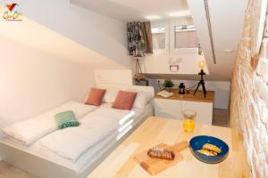Posteľ alebo postele v izbe v ubytovaní Apartments Opa Opa