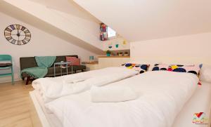 Posteľ alebo postele v izbe v ubytovaní Apartments Opa Opa