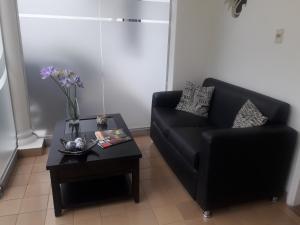 Khu vực ghế ngồi tại Hotel Casa Jardin