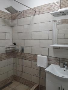 Et badeværelse på APARTMA SEA VIEW + 34 billeder