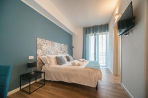 Katil atau katil-katil dalam bilik di Casa Stazione