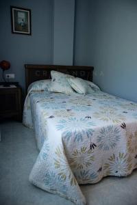 Posteľ alebo postele v izbe v ubytovaní Apartamento Amieiro