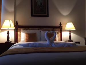 Letto o letti in una camera di Diwan Al Amir