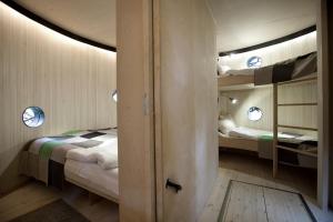 Ένα ή περισσότερα κρεβάτια σε δωμάτιο στο Treehotel