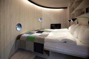 Ένα ή περισσότερα κρεβάτια σε δωμάτιο στο Treehotel