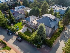 an aerial view of a house with a roof at Farys in Jastrzębia Góra