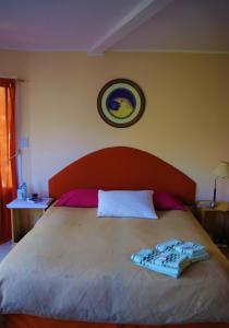 Cama ou camas em um quarto em Familia Piatti B&B - Suites