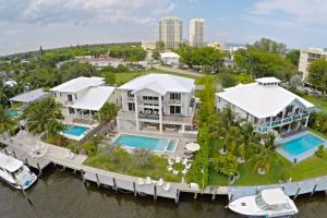 an aerial view of a house on the water at Villa Estelle in Miami