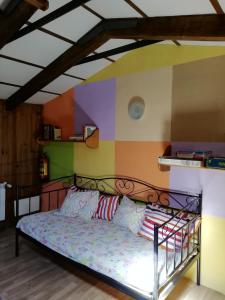 Ένα ή περισσότερα κρεβάτια σε δωμάτιο στο La Casa de Colores