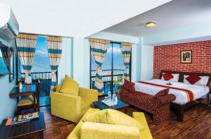 Vuode tai vuoteita majoituspaikassa Hotel Himalayan Villa