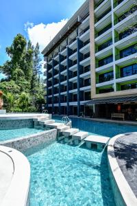 Bazén v ubytování Areca Resort and Spa nebo v jeho okolí