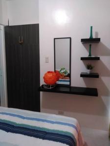 Giường trong phòng chung tại HappyNest 1561 @ Cityland Tagaytay +5 ảnh