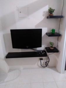 TV/trung tâm giải trí tại HappyNest 1561 @ Cityland Tagaytay