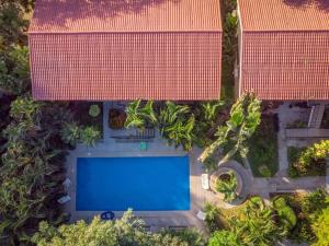 Πισίνα στο ή κοντά στο Coco Beach Home