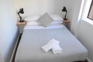 Postel nebo postele na pokoji v ubytování Manly Beach Guesthouse