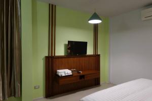 TV a/nebo společenská místnost v ubytování Kanlaya Place
