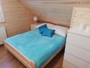 Postel nebo postele na pokoji v ubytování Apartamenty Jaworzynka