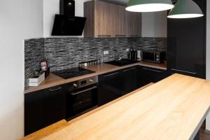 Kuchyňa alebo kuchynka v ubytovaní Old Town Luxury Apartment in heart of Bratislava