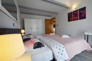 Postel nebo postele na pokoji v ubytování Guesthouse Mila