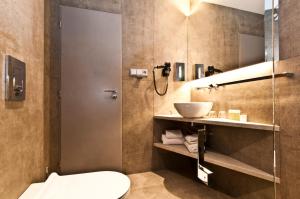 Koupelna v ubytování Akcent hotel