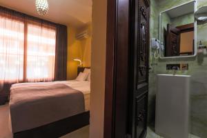 Katil atau katil-katil dalam bilik di Hotel Premier