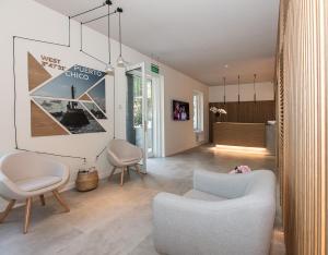 Zona de estar de Hotel El Balcón de la Bahía Suites - Domus Selecta Hotusa