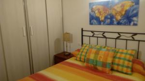 Кровать или кровати в номере Casa individual barrio las escuelas