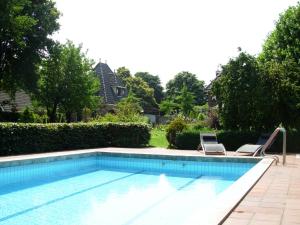 Swimming pool sa o malapit sa Logies Taverne nearby Roermond, Thorn en Weert